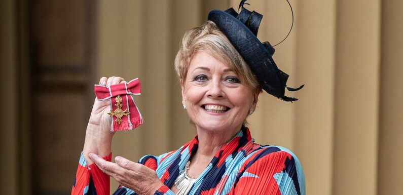 Anne Diamond looks delighted as she receives an OBE from King Charles