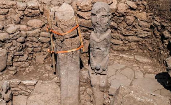 Archaeologists baffled after finding 11,000-year-old statue of man in saucy pose