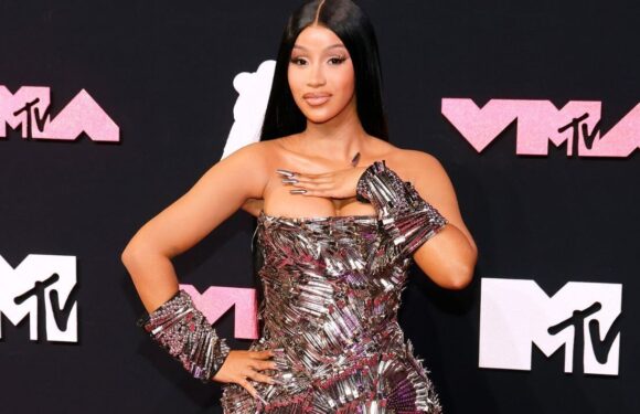 Cardi B goes topless on a plane to shows off ‘TikTok fix after outfit mishap