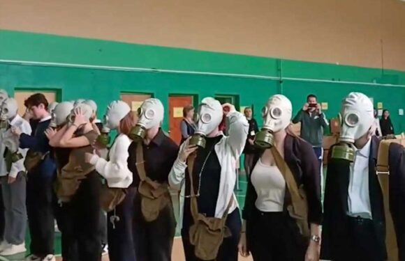 Chilling moment ‘nuke incoming’ sirens sound & schoolkids wear gas masks in war drills as Putin readies Russians for WW3 | The Sun