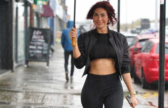 Chloe Ferry flashes her abs in crop top as she battles Storm Babet in Newcastle | The Sun