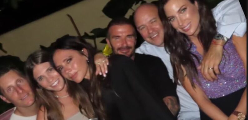 David Beckham can't keep his hands off his wife Victoria