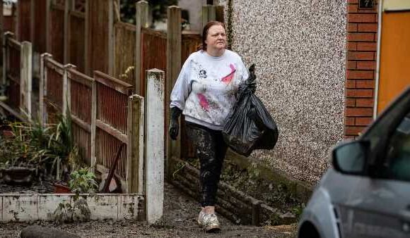 Devastated mother enters home destroyed by Storm Babet after flooding