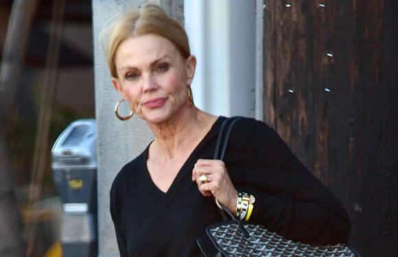 EXCLUSIVE: Belinda Carlisle looks unrecognizable, steps out with CANE