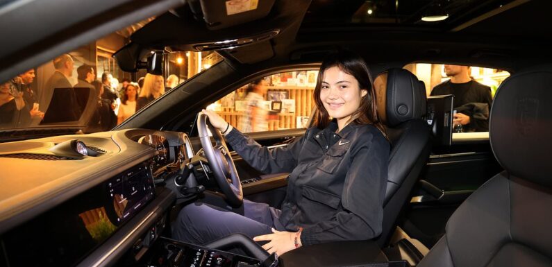 Emma Raducanu looks right at home in the driving seat of a Porsche