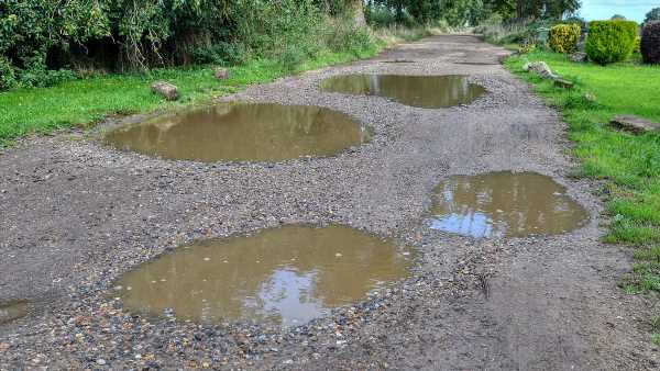 Furious villagers 'cut off' by potholes on their ancient Roman road