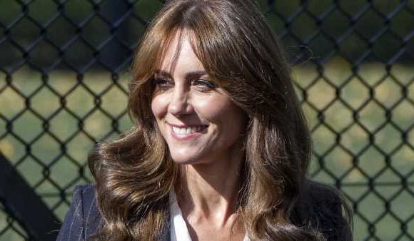 Kate's elegant royal pinstripes are 'dressing to be heard'
