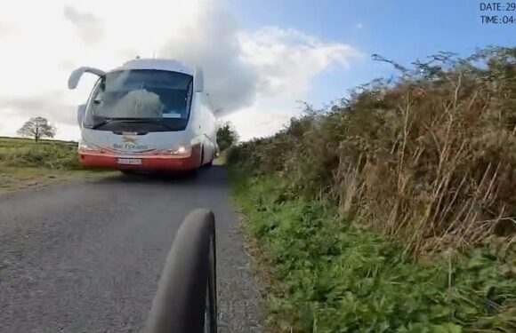 Moment bus driver reported for dangerous overtake of cyclist