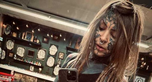 Mum with £17k worth of ink wows in lace undies and crop top to flaunt tattoos