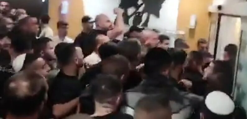 Shock moment 150 football ultras from notorious La Familia gang storm Israeli hospital hunting Hamas terrorists | The Sun