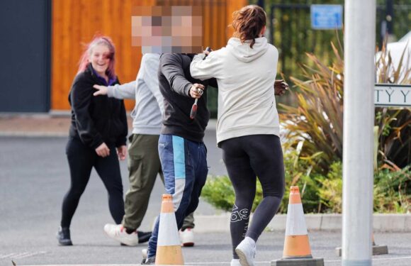 Shocking moment FIGHT breaks out between two women on school-run as fed-up locals block parent drivers with deckchairs | The Sun