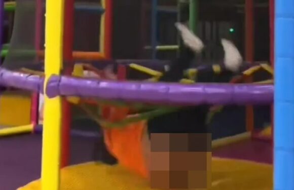 The mortifying moment a woman flashes a whole soft play centre when her trousers fall down as she battles the equipment | The Sun