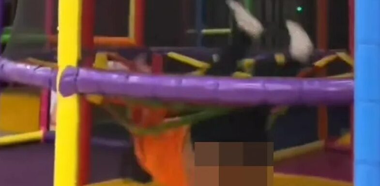 The mortifying moment a woman flashes a whole soft play centre when her trousers fall down as she battles the equipment | The Sun