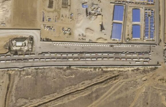 Trucks mass at Gaza border as they wait to bring aid to desperate…