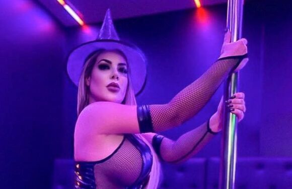 Worlds hottest lawyer turns pole dancing witch as she teases spooky content