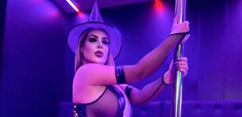 Worlds hottest lawyer turns pole dancing witch as she teases spooky content