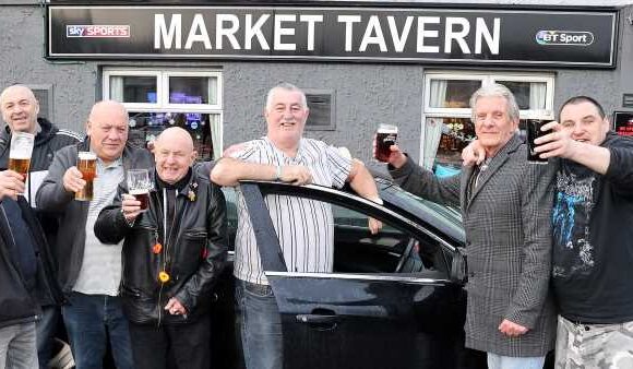 Bar boss beats bus strike by picking up his regulars himself