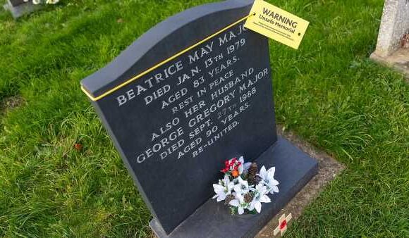 'Disrespectful' yellow 'unsafe memorial' tags stuck on gravestones
