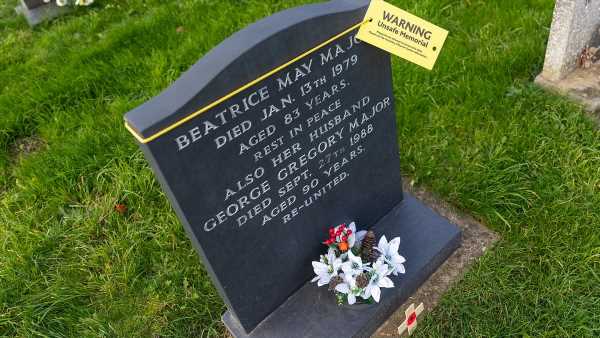 'Disrespectful' yellow 'unsafe memorial' tags stuck on gravestones
