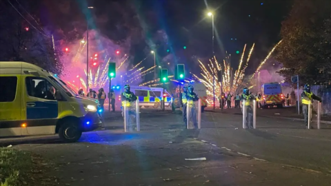 Eight police officers injured in Bonfire Night chaos in Scotland as riot cops targeted with petrol bombs & fireworks | The Sun
