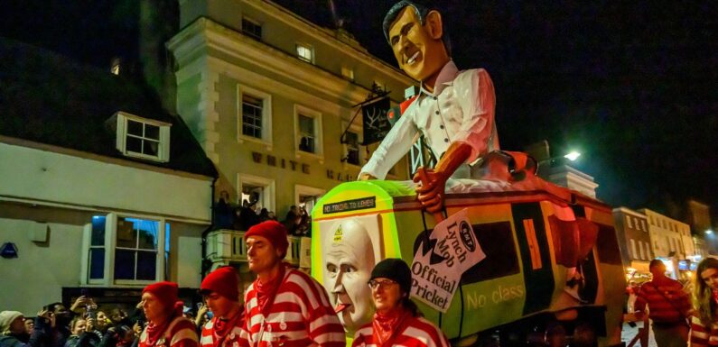 Huge Rishi Sunak effigy carried through streets for UK bonfire as revellers boo