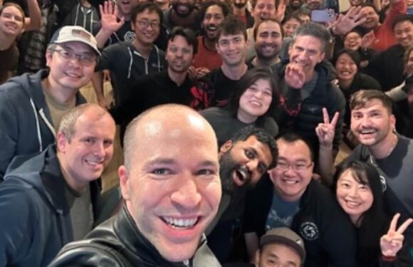 Jubilant staff celebrate the return of OpenAI whiz kid Sam Altman