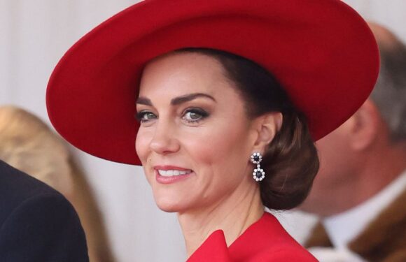 Kate Middleton ravishing in red designer cape with statement bow as she and William arrive at Horse Guards Parade
