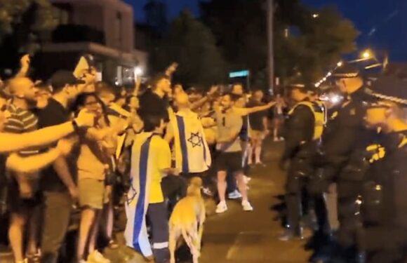 Man hit by rock during violent protest near burnt-out Caulfield shop