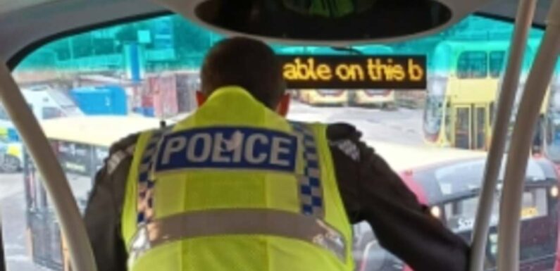 Police ride double decker buses to catch drivers using mobile phones