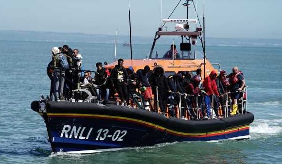 Rescuers let 'migrant boat with engine failure to continue to the UK'