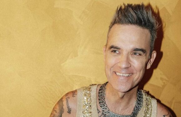 Robbie Williams claims he's going through 'manopause'