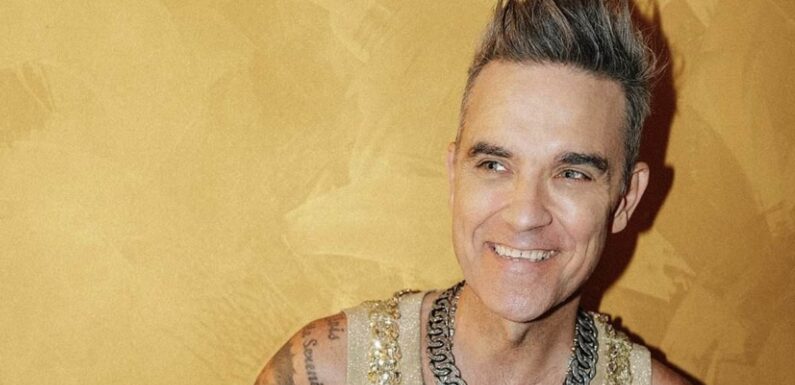 Robbie Williams claims he's going through 'manopause'