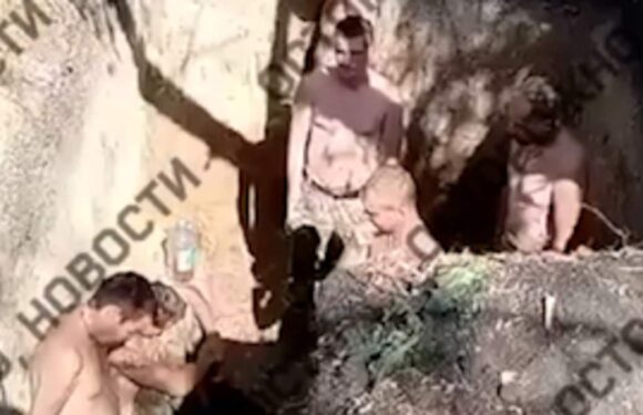 Russian soldiers thrown naked into pit until they pay £4,000 bribe