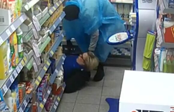 Terrifying moment masked thieves tie up female staff at village shop