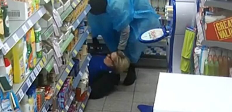 Terrifying moment masked thieves tie up female staff at village shop
