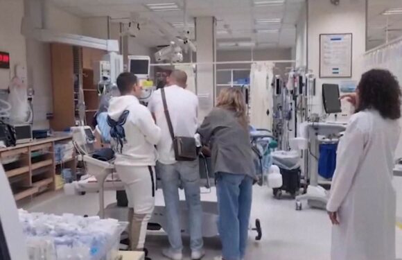 WATCH: Israeli hostage reunited with family after being shot by Hamas