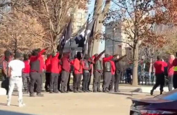 White Supremacists march through Wisconsin Capitol waving swasti