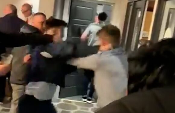 Fight breaks out at Aintree racecourse as security stand and watch
