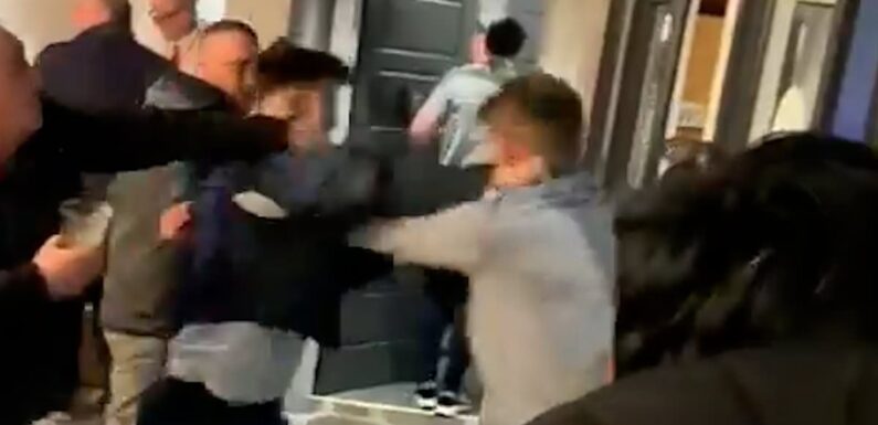 Fight breaks out at Aintree racecourse as security stand and watch