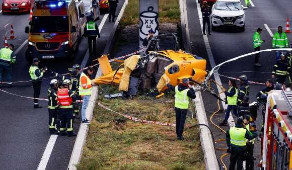 Helicopter crashes onto busy Spanish motorway