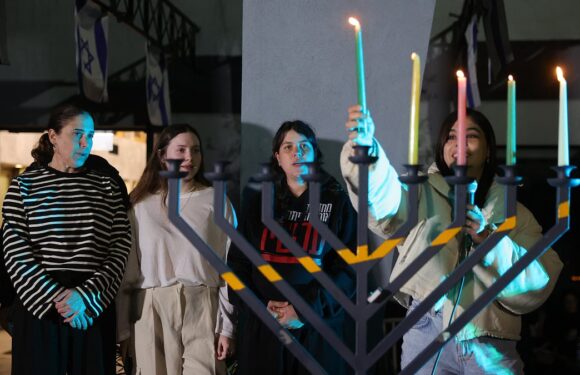 Israelis demand the release of Hamas hostages at moving Hanukkah vigil