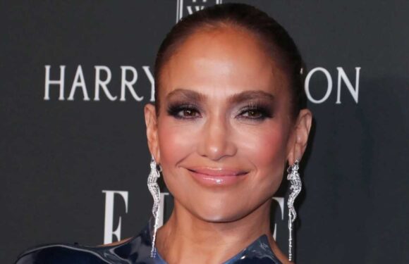 Jennifer Lopez flashes underboob as she poses in very unusual red carpet dress with Ben Affleck | The Sun