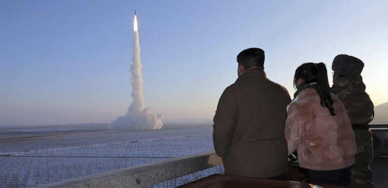 Kim Jong Un threatens U.S. as he watches missile launch with daughter