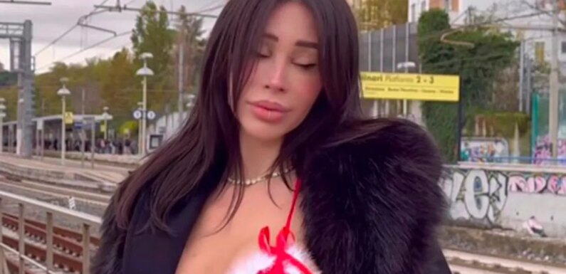 Model hailed ‘perfect gift’ as she dons skimpy festive lingerie to train station