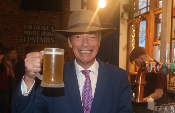 Nigel Farage celebrates arriving home in UK after I'm A Celebrity