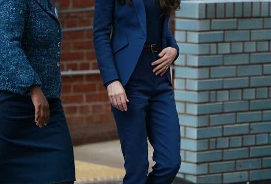 Princess Kate stepped out solo in a McQueen suit after being named a racist royal
