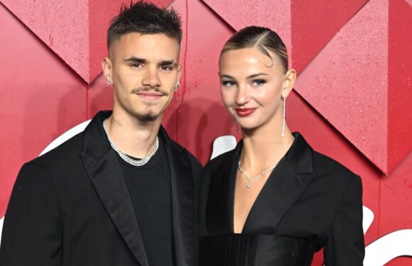 Romeo Beckham and Mia Regan put on loved-up display in matching outfits at Fashion Awards
