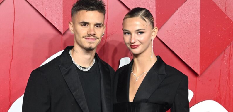 Romeo Beckham and Mia Regan put on loved-up display in matching outfits at Fashion Awards