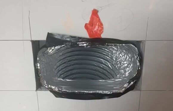 Savvy mother builds DIY laundry chute in her house