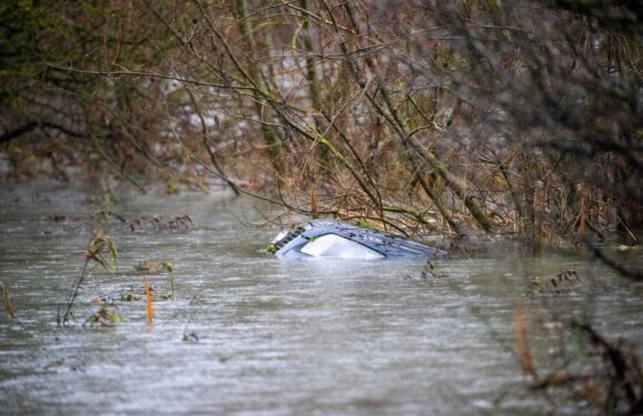 UK weather: Cars caught in floods as rain hits Britain – with Met Office warning more chaos is on way with 80mph winds | The Sun